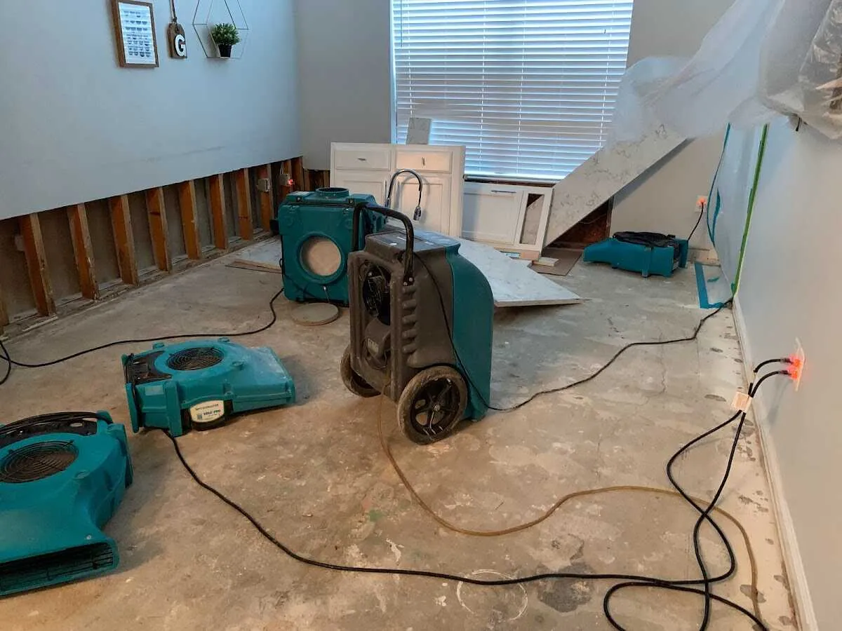 Dehumidifier in flood-cut room for Water Damage Restoration in Little Elm